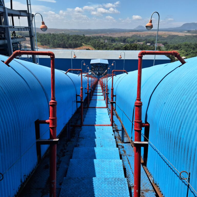 Industrial Walkway Between Storage Tanks