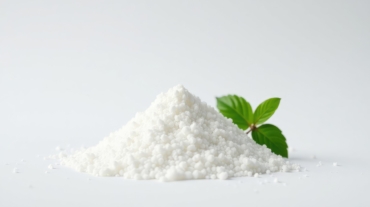 Pile of white granulated sugar on white background, food photography, white background
