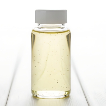 vecteezy_clear-glass-bottle-with-yellow-liquid-on-white-wood-surface_71454734