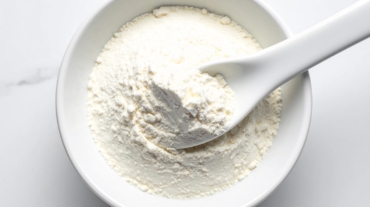 vecteezy_close-up-of-a-spoon-of-collagen-powder-in-a-white-ceramic_72985278
