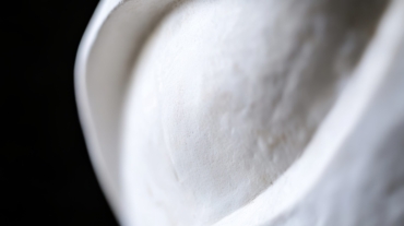 vecteezy_close-up-of-a-white-ceramic-sculpture-showcasing-smooth-curves_71010072