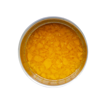 Comparative image of orange pulp in water like feces in stainless steel bowl isolated on white background with clipping path